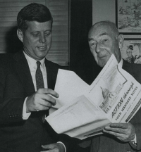 George Burger, Sr., NFIB’s first full-time lobbyist in Washington, D.C., shows Sen. John F. Kennedy the federal Mandate.